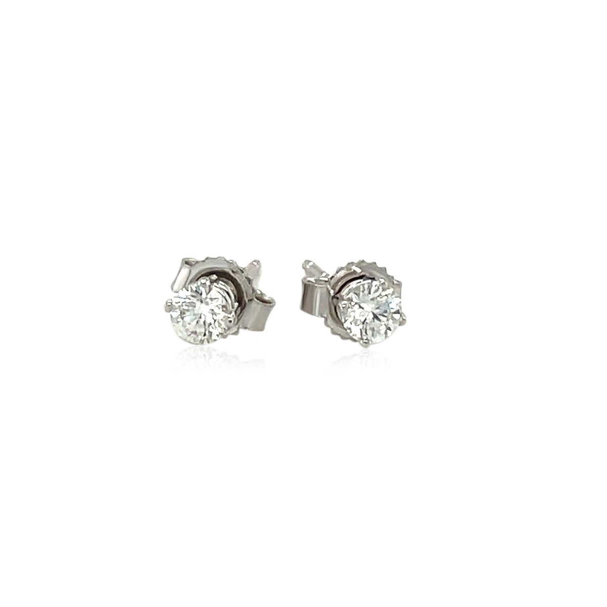 Puces d'oreilles à quatre griffes en or blanc 14 carats et diamants (0,25 carat total)