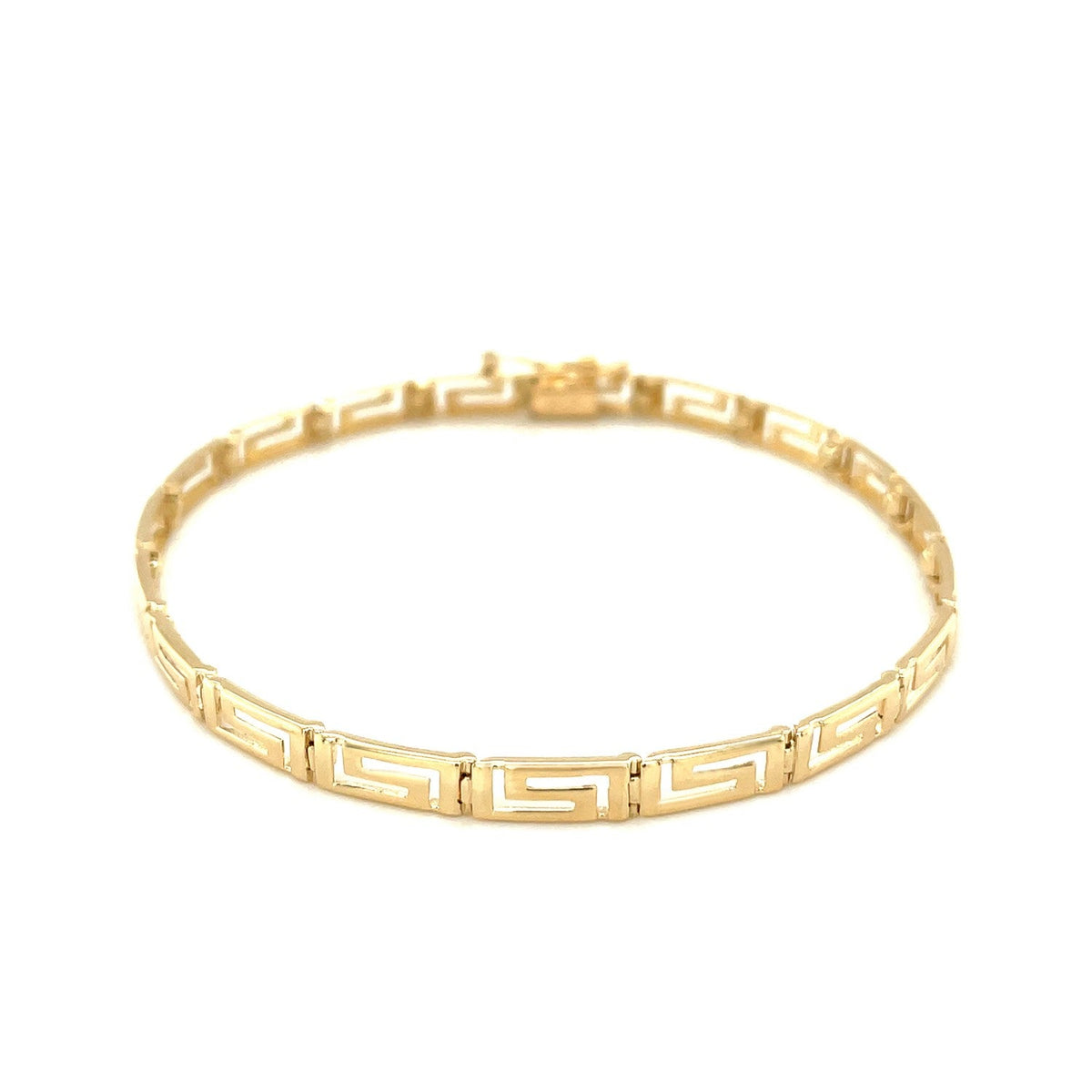 Bracelet fantaisie en or jaune 14 carats avec motif grec.