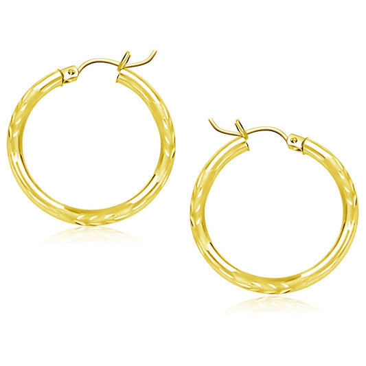 Créoles en or jaune 14 carats taillées au diamant (25 mm)
