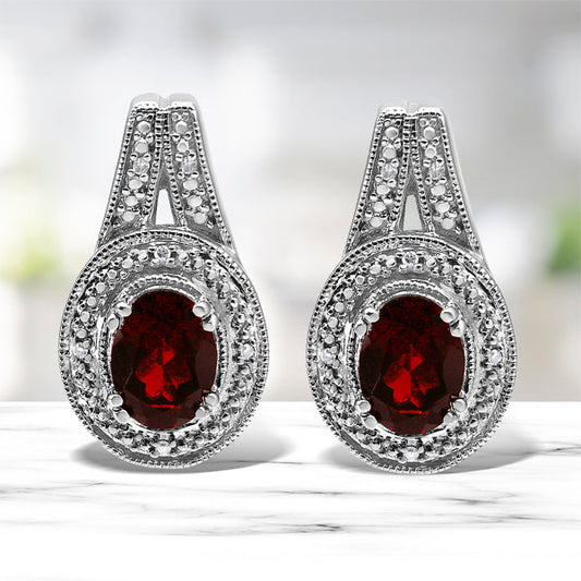 .925 Sterling Silver Diamond Accent and 8x6mm Red Oval Garnet Stud Earrings (I-J Color, I1-I2 Clarity)