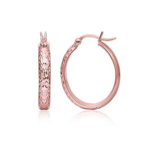 Boucles d'oreilles créoles ovales martelées en or rose 14 carats