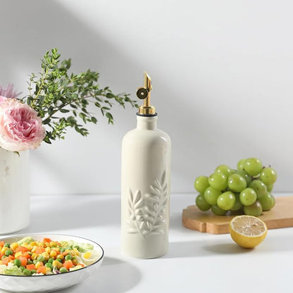 Sweejar 18 Oz Oil Dispenser for Kitchen with Gravity Spout, Ceramic Olive Oil Dispenser Bottle, Relief Opaque Vinegar Container for Evoo, Vinegar, Soy Sauce, Pack of 1(Beige, Gold Spout)
