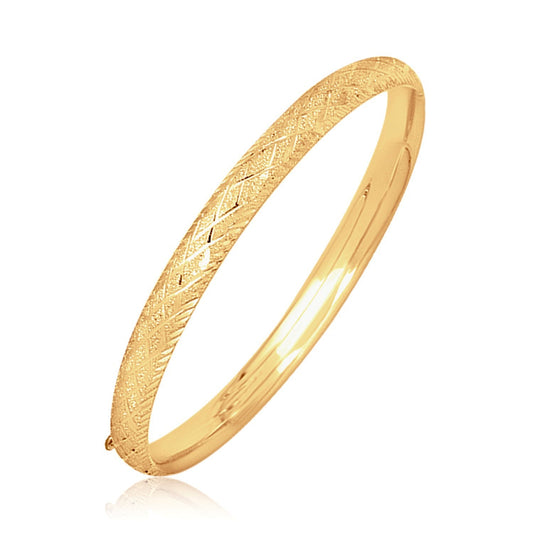 Jonc sculpté en or jaune 14 carats et diamants (6,00 mm)
