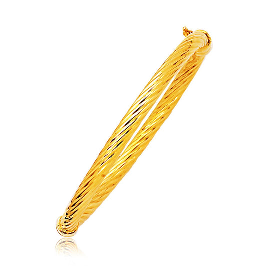 Jonc en or jaune 14 carats motif câble poli