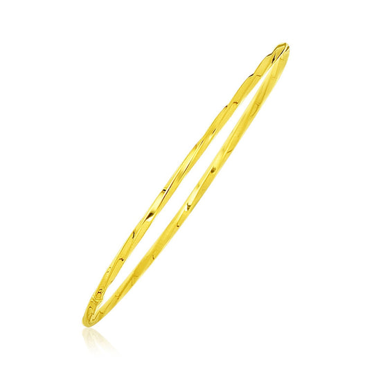 Jonc fin torsadé brillant en or jaune 14 carats