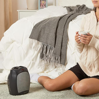 Amazon Basics Ceramic Space Heater, Portable Indoor Heating Solution, With Overheat and Tip-Over Protection, Thermostat, Non-Oscillating, 1500W, 7.52"D x 6.34"W x 9.45"H, Black