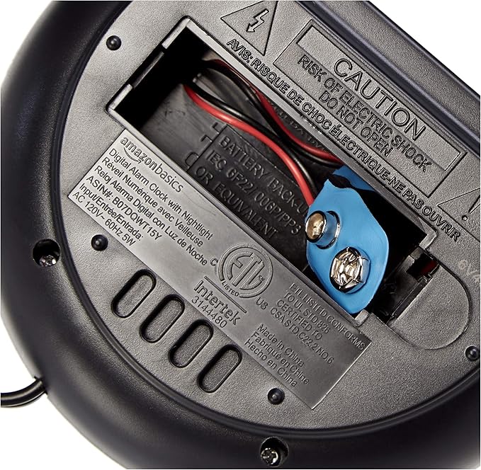 Amazon Basics Small Digital Oval Alarm Clock With LED Display, Nightlight & Battery Backup, Black, 4.5 x 3.5 x 2.4 Inches