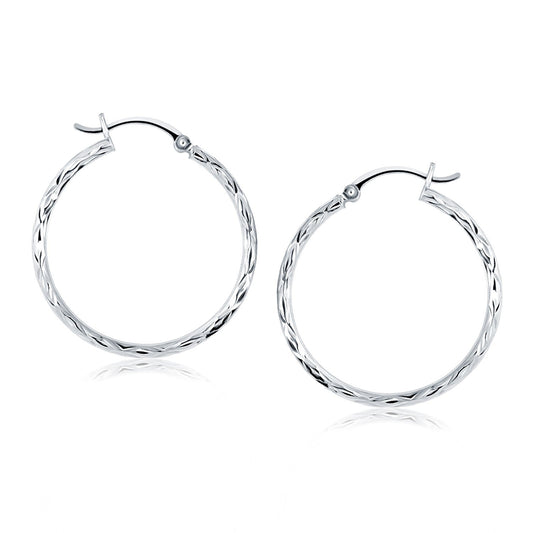 Boucles d'oreilles créoles coupe diamant en or blanc 14 carats