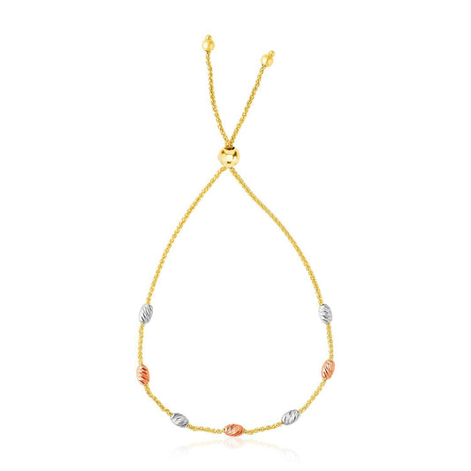 Bracelet de style lariat avec stations ovales texturées en or tricolore 14 carats