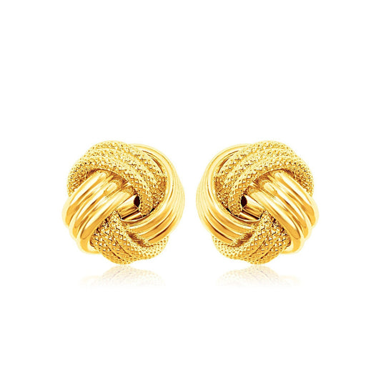 Boucles d'oreilles nœud d'amour en or jaune 14 carats texturées.
