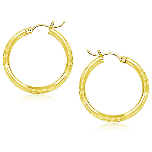 Boucles d'oreilles créoles en or jaune 10 carats taillées au diamant (25 mm)