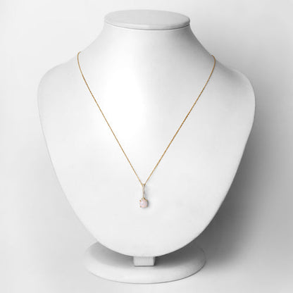 0.53 Carat Genuine Ethiopian Opal and White Diamond 10K Yellow Gold Pendant