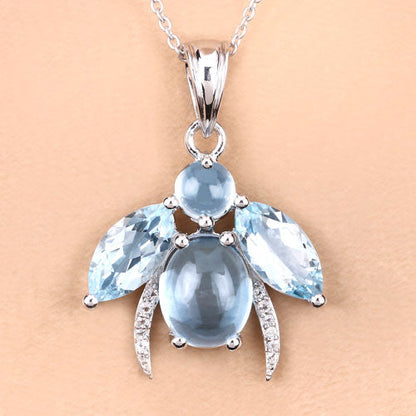 9.06 Carat Genuine Blue Topaz and White Topaz .925 Sterling Silver Pendant
